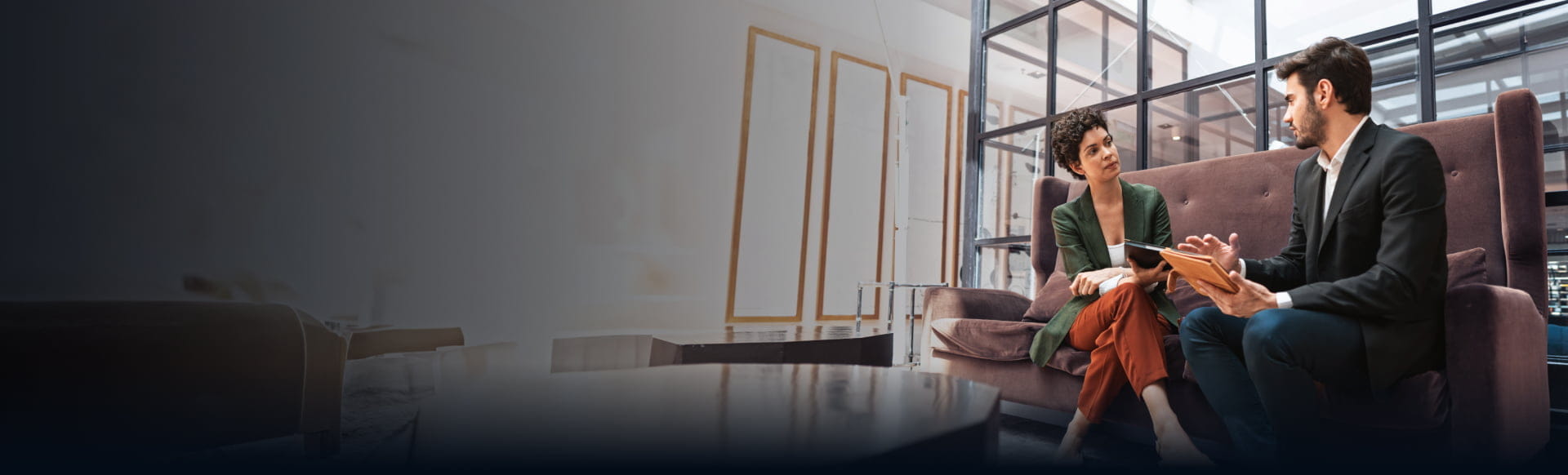 Two professionals in conversation, highlighting StoneX Wealth Management's integrated advisor platform and multiple affiliation options